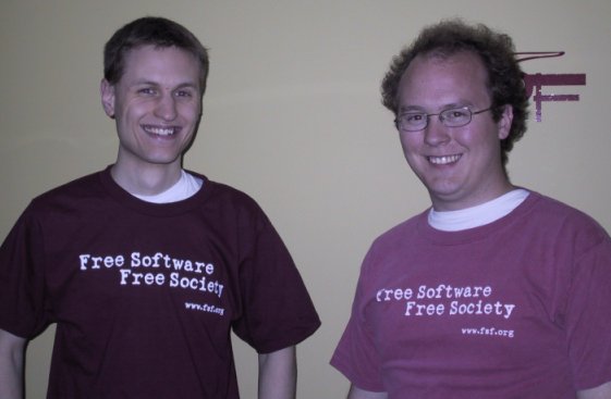 Two gues in maroon t-shirts